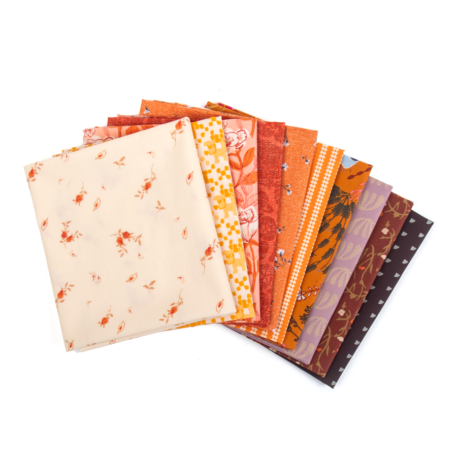 Amber Sunset Curated Fat Quarter Bundle | Art Gallery Fabrics in shades of cream, yellow, orange, pink, mauve, and brown.